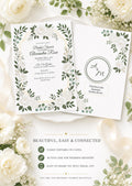 Two white bridal shower invitations with green and white floral borders, one showing event details and the other a registry link, surrounded by white flowers and green leaves.