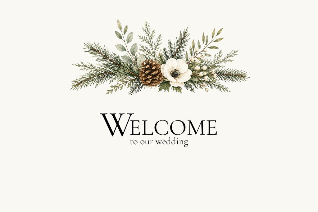 A wedding welcome sign featuring a floral arrangement at the top with a pinecone, white flower, and pine branches above the text Welcome to our wedding.